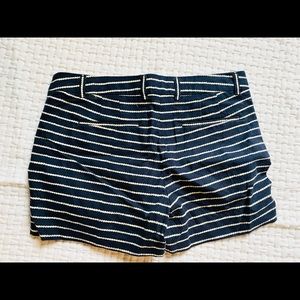 Navy and white shorts.
